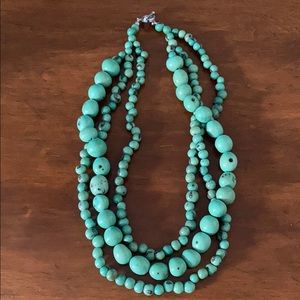 Turquoise colored bead three strand necklace
